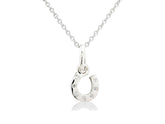 A sterling silver horseshoe pendant decorated with sparkly stones on a chain.